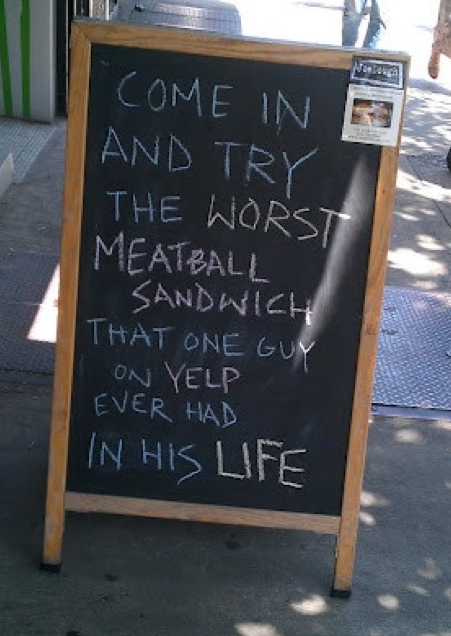 Chalk Sandwich board referencing Yelp review